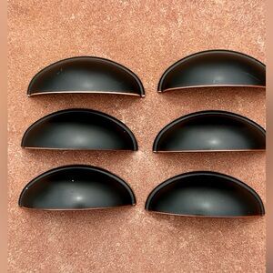 6 Bronze colored pre-owned Cabinet Drawer Pulls. No screws included.